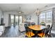 Open living room and dining area with hardwood floors at 5801 Oyster Catcher Dr. # 434, North Myrtle Beach, SC 29582