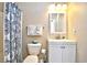 Simple bathroom with shower, toilet, and white vanity at 5801 Oyster Catcher Dr. # 434, North Myrtle Beach, SC 29582