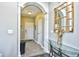 Bright entryway with tiled floor and glass-top table at 5801 Oyster Catcher Dr. # 434, North Myrtle Beach, SC 29582