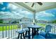 Private balcony with table and chairs, overlooking the community at 5801 Oyster Catcher Dr. # 434, North Myrtle Beach, SC 29582