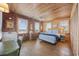 Cozy bedroom with a queen bed, hardwood floors, and ocean views at 496 Myrtle Ave., Pawleys Island, SC 29585