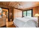 Cozy bedroom with twin beds, wood floors, and built-in closets at 496 Myrtle Ave., Pawleys Island, SC 29585