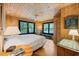 Bright bedroom featuring a king-size bed and ample natural light at 496 Myrtle Ave., Pawleys Island, SC 29585