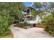 Charming two-story home with a spacious front yard at 496 Myrtle Ave., Pawleys Island, SC 29585