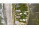 Aerial view of beachfront property with houses and lush greenery at 496 Myrtle Ave., Pawleys Island, SC 29585