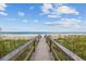 Private beach access boardwalk leading to the ocean at 496 Myrtle Ave., Pawleys Island, SC 29585
