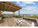 Beachfront deck with seating, hammock, and ocean views at 496 Myrtle Ave., Pawleys Island, SC 29585