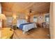 Main bedroom with ensuite bath, hardwood floors, and a ceiling fan at 496 Myrtle Ave., Pawleys Island, SC 29585