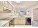Open kitchen with views to living room and dining area at 4103 Pinehurst Circle # Bb-12, Little River, SC 29566