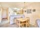 Dining area with table and chairs, open to living room at 4103 Pinehurst Circle # Bb-12, Little River, SC 29566
