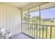 Relaxing screened balcony overlooking a tranquil landscape at 4103 Pinehurst Circle # Bb-12, Little River, SC 29566