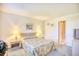 Bedroom with double bed, nightstands, and access to bathroom at 4103 Pinehurst Circle # Bb-12, Little River, SC 29566