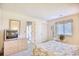 Bedroom with double bed, dresser, and access to balcony at 4103 Pinehurst Circle # Bb-12, Little River, SC 29566