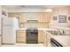 Well-equipped kitchen with ample storage and a modern stovetop at 4103 Pinehurst Circle # Bb-12, Little River, SC 29566