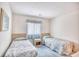 Bedroom with two twin beds, nightstand, and window at 4103 Pinehurst Circle # Bb-12, Little River, SC 29566