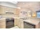 Kitchen boasts light wood cabinets, and modern appliances at 4103 Pinehurst Circle # Bb-12, Little River, SC 29566