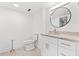 Clean bathroom with granite vanity and a large mirror at 7509 N Ocean Blvd. # 103, Myrtle Beach, SC 29572