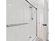 Modern shower with glass enclosure and marble accents at 7509 N Ocean Blvd. # 103, Myrtle Beach, SC 29572