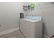 Convenient laundry room with washer, dryer, and shelving at 1620 Palmetto Palm Dr., Myrtle Beach, SC 29579