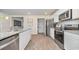 Kitchen with stainless steel appliances, granite countertops, and walk-in pantry at 161 Country Grove Way, Galivants Ferry, SC 29544