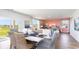 Bright dining area with view to backyard and adjacent living room at 193 Hadley Springs Ave, Longs, SC 29568