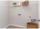 Functional laundry room with wire shelving, a hamper, and space for a washer and dryer at 201 Hadley Springs Ave, Longs, SC 29568