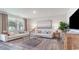 Cozy living room with neutral decor and ample natural light at 201 Hadley Springs Ave, Longs, SC 29568