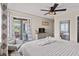 Bedroom with a balcony and dresser at 5601 N Ocean Blvd. # 315-C, Myrtle Beach, SC 29577