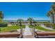 Ocean view from a walkway with lush landscaping at 5601 N Ocean Blvd. # 315-C, Myrtle Beach, SC 29577