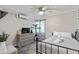 Bedroom with a metal bed frame, dresser, and patterned rug at 5601 N Ocean Blvd. # 315-C, Myrtle Beach, SC 29577