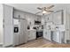 Modern kitchen featuring gray cabinets, stainless steel appliances, and tile backsplash at 5601 N Ocean Blvd. # 315-C, Myrtle Beach, SC 29577