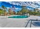 Community pool with a pool house and surrounding picnic tables at 6850 Blue Heron Blvd. # 406, Myrtle Beach, SC 29588