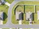 Aerial view of two houses with yards and street at 197 Golden Bear Circle, Longs, SC 29568