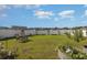 Spacious backyard with lawn, garden, and seating area at 197 Golden Bear Circle, Longs, SC 29568