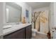 Bathroom with shower/tub combo and updated vanity at 197 Golden Bear Circle, Longs, SC 29568