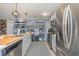 Modern kitchen with stainless steel appliances and light cabinets at 197 Golden Bear Circle, Longs, SC 29568