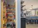 Well-organized pantry with ample shelving for storage at 197 Golden Bear Circle, Longs, SC 29568