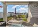 Relaxing patio with seating area and backyard access at 197 Golden Bear Circle, Longs, SC 29568