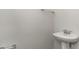 Small powder room with pedestal sink and grab bar at 1020 Barrington Way, Conway, SC 29526