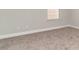 Simple carpeted bedroom with neutral walls and window with blinds at 1020 Barrington Way, Conway, SC 29526
