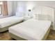 Bedroom with two twin beds and ocean view at 202 74Th Ave. N # 2447-2448, Myrtle Beach, SC 29572