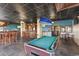 Relaxing game room with a pool table and bar at 202 74Th Ave. N # 2447-2448, Myrtle Beach, SC 29572
