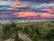 Beachfront view at sunset with palm trees at 2504 N Ocean Blvd. # 1634, Myrtle Beach, SC 29577