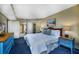 King size bed in spacious bedroom, blue accents at 2504 N Ocean Blvd. # 1634, Myrtle Beach, SC 29577