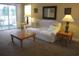 Living room with sofa, end tables and a coffee table at 5011 Harvest Dr. # 203, Myrtle Beach, SC 29579