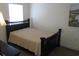 Cozy bedroom with a double bed, dresser, and calming wall art at 5011 Harvest Dr. # 203, Myrtle Beach, SC 29579
