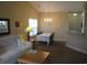 Dining area with table and chairs next to the living room at 5011 Harvest Dr. # 203, Myrtle Beach, SC 29579