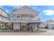 Elevated beach home with carport and deck at 6001-1889 S Kings Hwy., Myrtle Beach, SC 29575