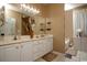 Double vanity bathroom with a large mirror and a bathtub at 5356 Hamps Rd., Nichols, SC 29581