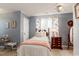 Bedroom with twin-size bed, dresser and window with curtains at 5356 Hamps Rd., Nichols, SC 29581